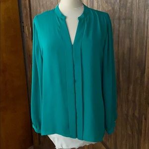 Chico’s green pleated blouse